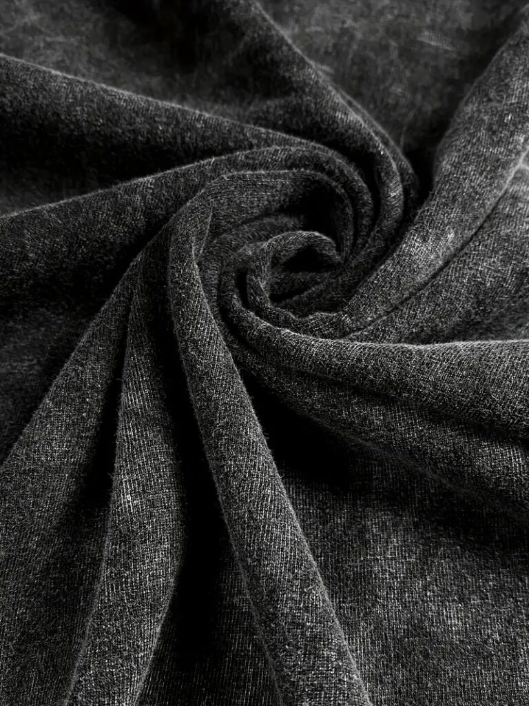 Close-up of fabric texture on Dusters Vintage Hoodie – Faded Plum, part of Dusters vintage tees lineup